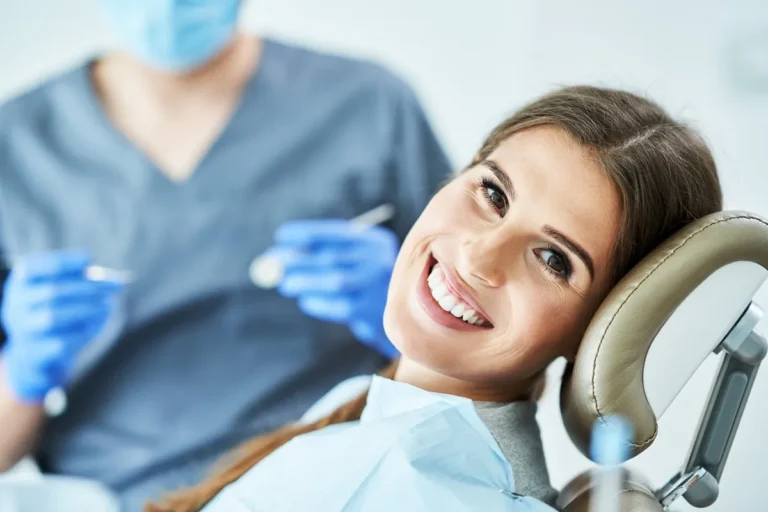 Male dentist and woman in dental clinic